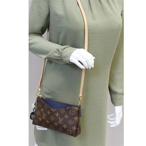 louis vuitton hand clutch|louis vuitton women's clutch.